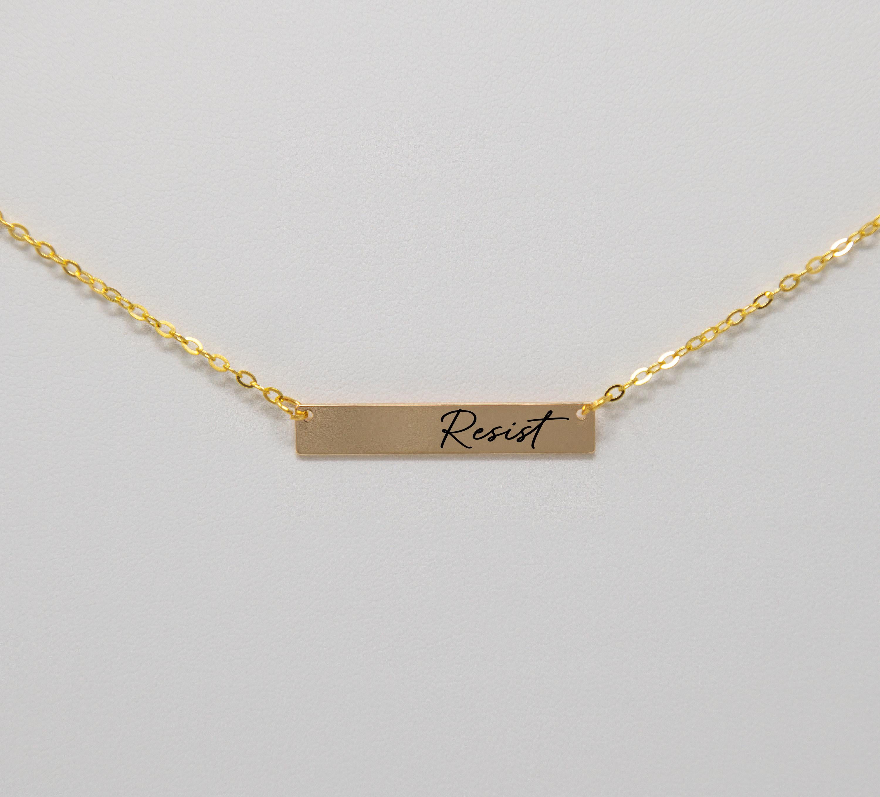 Resist engraved necklace 18k gold plated protest gear feminist
