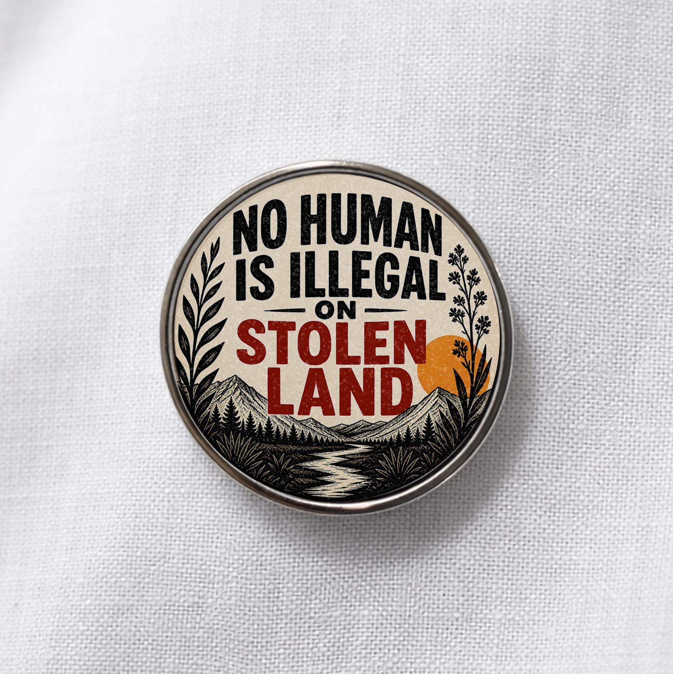 No Human Is Illegal on Stolen Land Lapel Pin